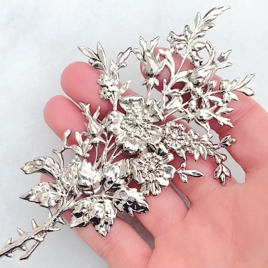 Broche de ramo de flores de plata vintage, video