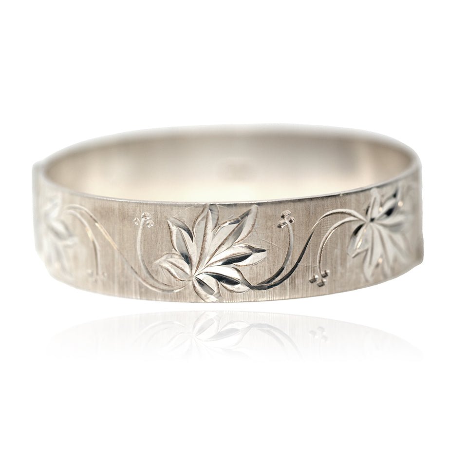 Pulsera rígida floral de plata vintage de 1974