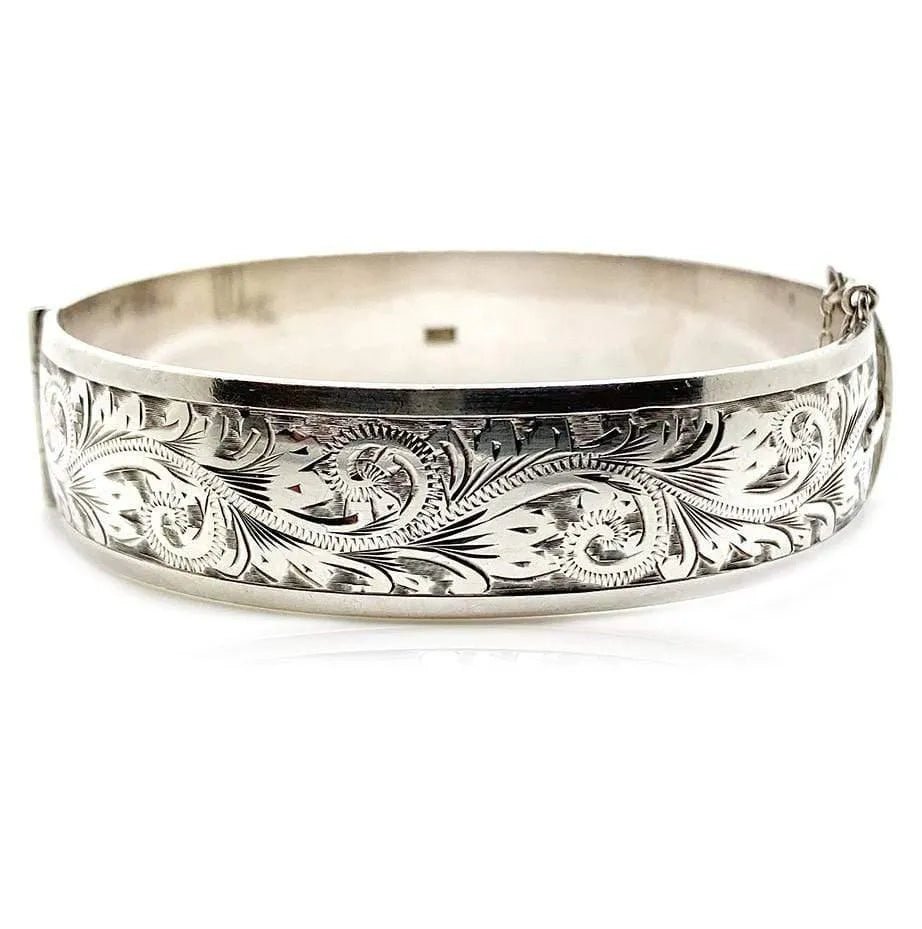 Brazalete tipo esclava grabado vintage de plata de ley 1987